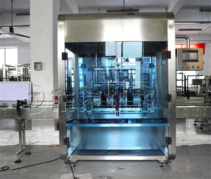 全自動油類灌裝機.jpg 全(quán)自動油類灌裝機.jpg